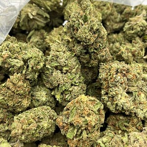 Fire OG Cannabis Strain - A Potent Indica-Dominant Hybrid with Earthy Undertones for Deep Relaxation